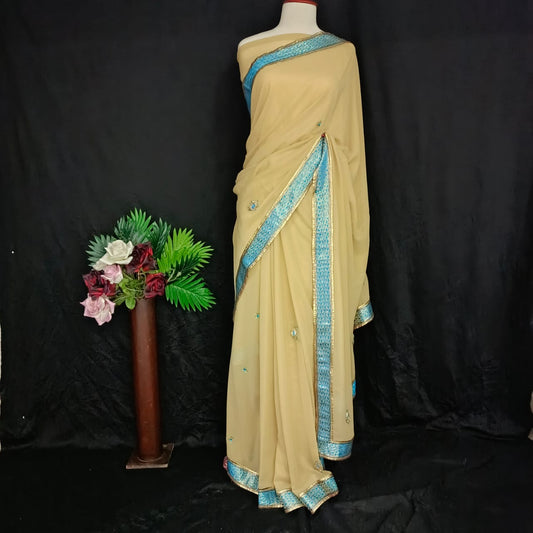 Beige Saree with Aqua Blue Embellished Border