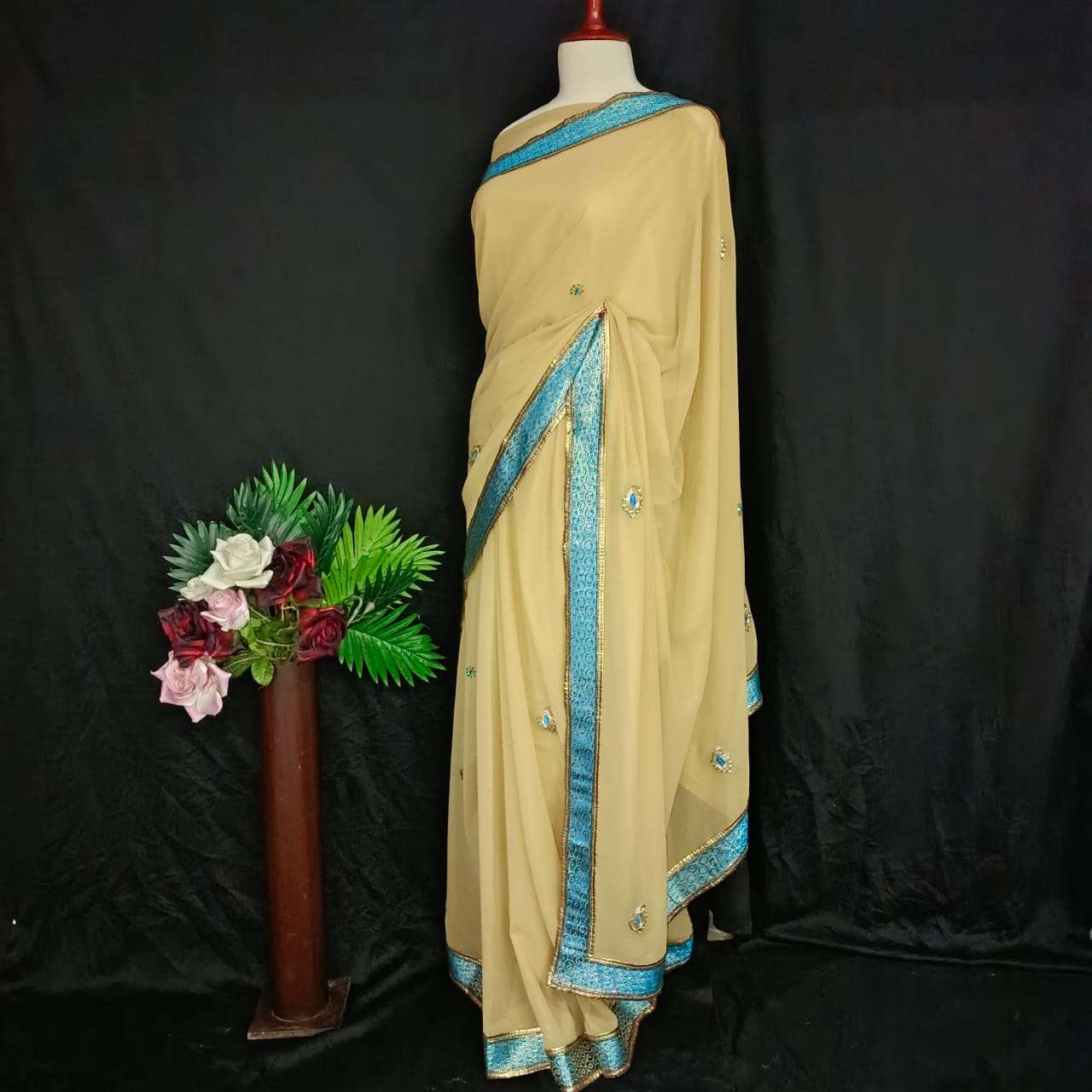 Beige Saree with Aqua Blue Embellished Border