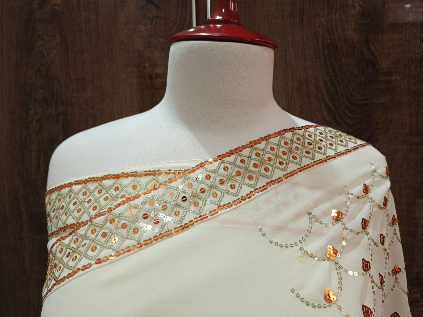 Graceful Off-White Georgette Saree with Copper Sequin Embroidery