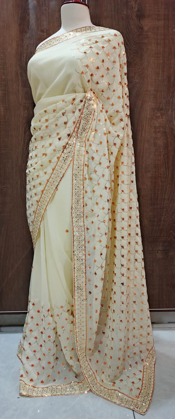Graceful Off-White Georgette Saree with Copper Sequin Embroidery