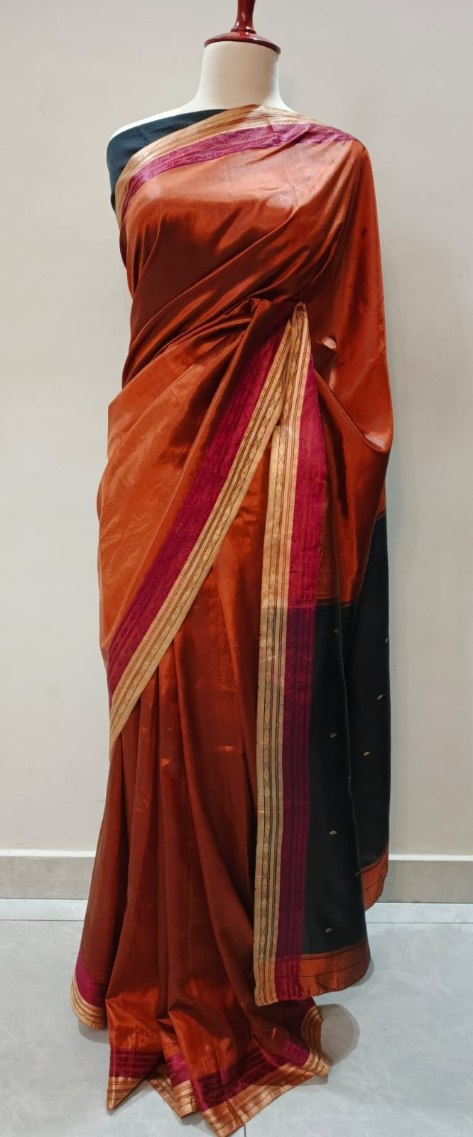 Regal Rust & Midnight Black Kanjeevaram Silk Saree with Zari Borders