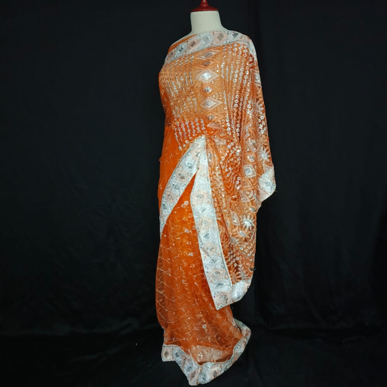 Elegant Orange Net Saree with Silver Sequin & Thread Embroidery