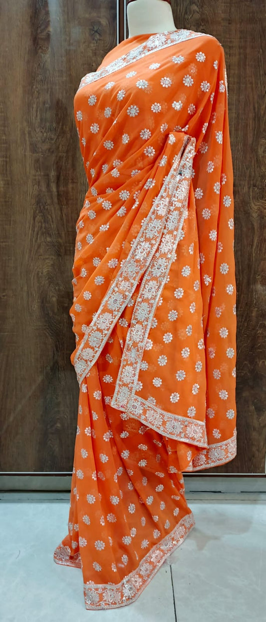 Elegant Orange Georgette Saree with Sequin and Thread Embroidery